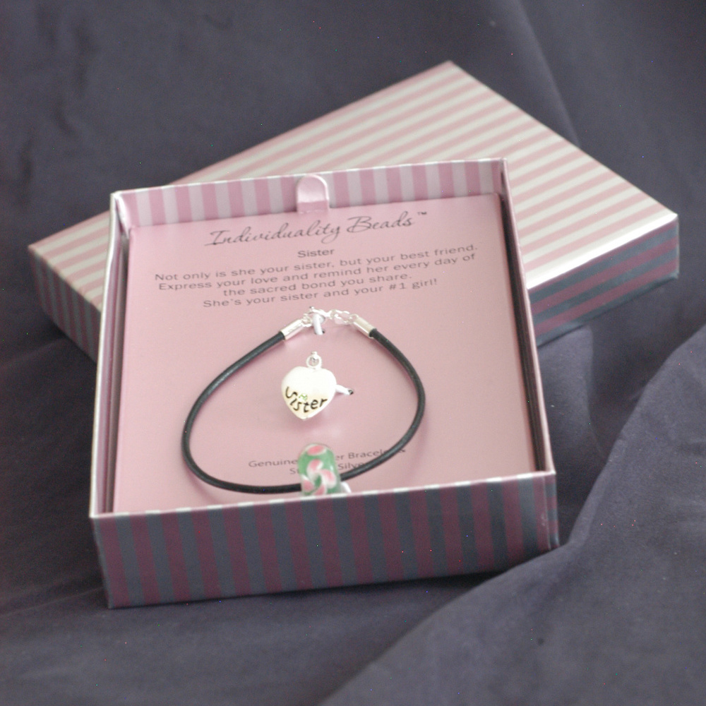 Sister sterling silver and leather charm bracelet.